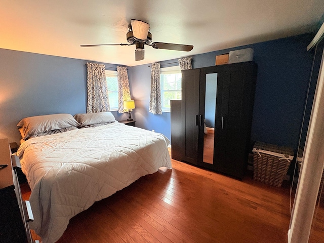 93 Holiday Park Dr, Centereach, NY 11720 - bedroom featuring wood finished floors and ceiling fan