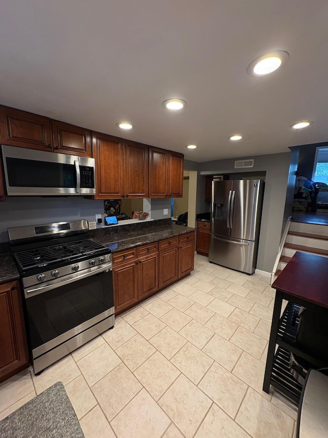 93 Holiday Park Dr, Centereach, NY 11720 - kitchen featuring stainless steel appliances, light tile patterned floors, and recessed lighting