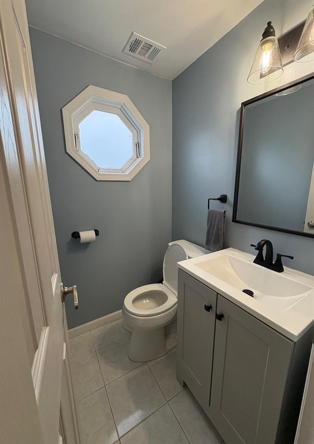 93 Holiday Park Dr, Centereach, NY 11720 - half bathroom featuring vanity and tile patterned floors