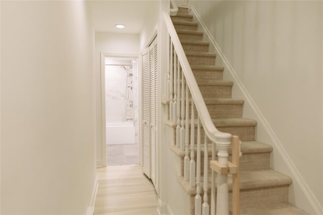 21 Canterbury Rd Unit 3, Great Neck, NY 11021 - stairway featuring wood finished floors and recessed lighting