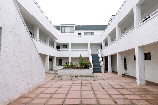 21 Canterbury Rd Unit 3, Great Neck, NY 11021 - view of patio / terrace with stairs