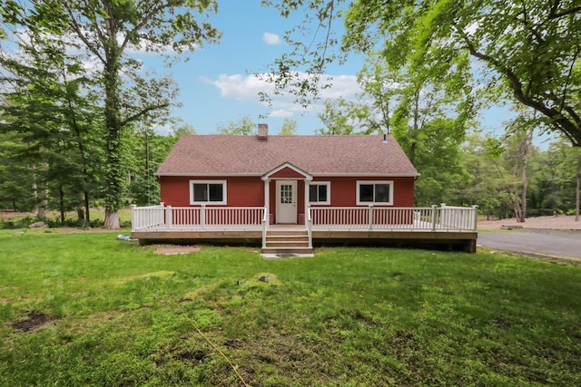 160 S Mountain Rd, New City, NY 10956 - view of front of property featuring a front lawn, a deck, and a chimney