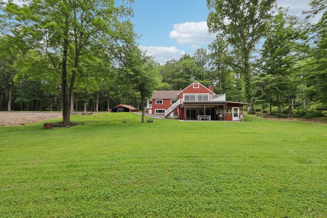 160 S Mountain Rd, New City, NY 10956 - view of grassy yard featuring stairs, a deck, and view of wooded area