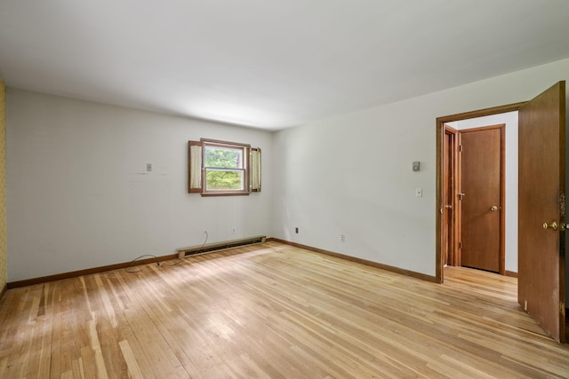 39 Knollwood Ln, Cold Spring, NY 10516 - empty room with baseboard heating and light wood-style floors