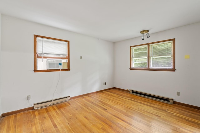 39 Knollwood Ln, Cold Spring, NY 10516 - empty room with a baseboard radiator and light wood-style flooring
