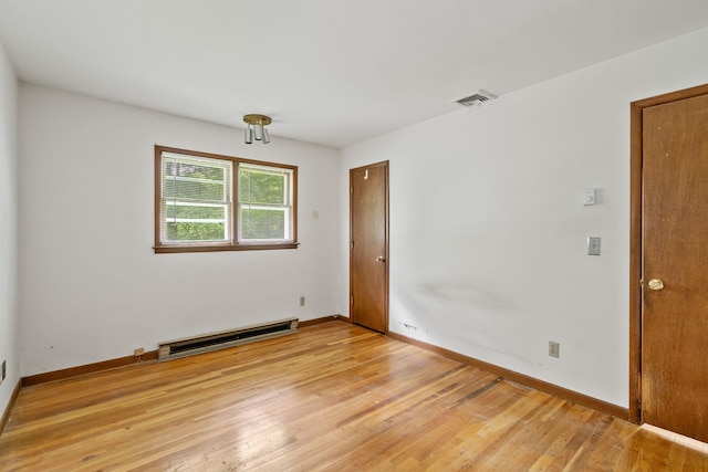39 Knollwood Ln, Cold Spring, NY 10516 - empty room with baseboard heating and light wood-style flooring