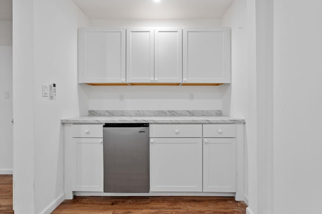 39 Knollwood Ln, Cold Spring, NY 10516 - kitchen featuring white cabinets, wood finished floors, refrigerator, and light stone counters