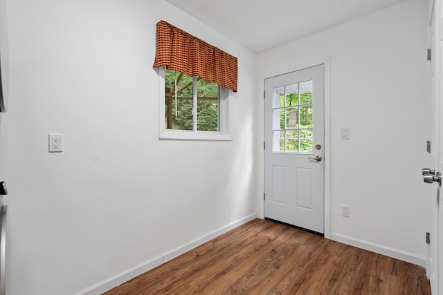 39 Knollwood Ln, Cold Spring, NY 10516 - doorway featuring baseboards and wood finished floors