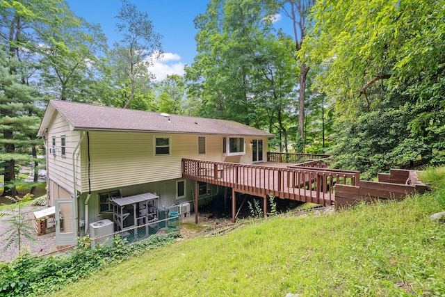 39 Knollwood Ln, Cold Spring, NY 10516 - rear view of property featuring a wooden deck and view of wooded area