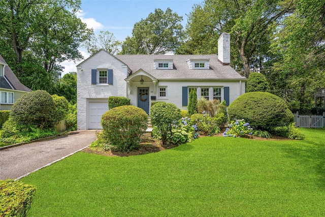 44 Kingsbury Rd, New Rochelle, NY 10804 - view of front of property featuring an attached garage, a chimney, and asphalt driveway