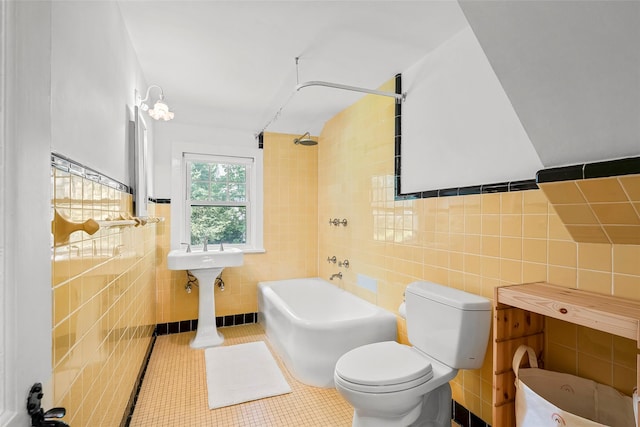 44 Kingsbury Rd, New Rochelle, NY 10804 - bathroom featuring tile walls, shower / tub combination, and tile patterned floors