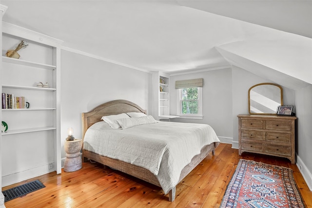 44 Kingsbury Rd, New Rochelle, NY 10804 - bedroom with wood-type flooring and crown molding