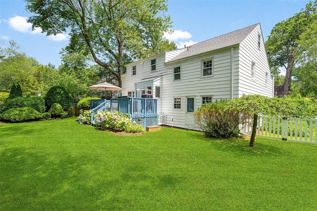 44 Kingsbury Rd, New Rochelle, NY 10804 - rear view of house featuring a deck and a shingled roof