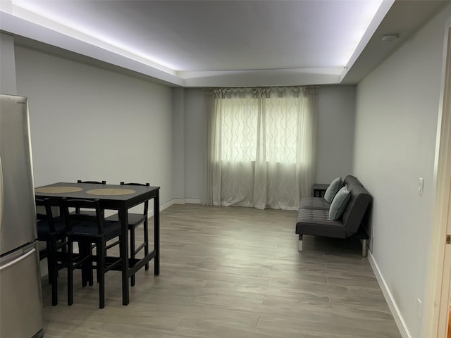158-15 Union Tpke Unit 204N, Fresh Meadows, NY 11366 - living area with a tray ceiling and light wood finished floors