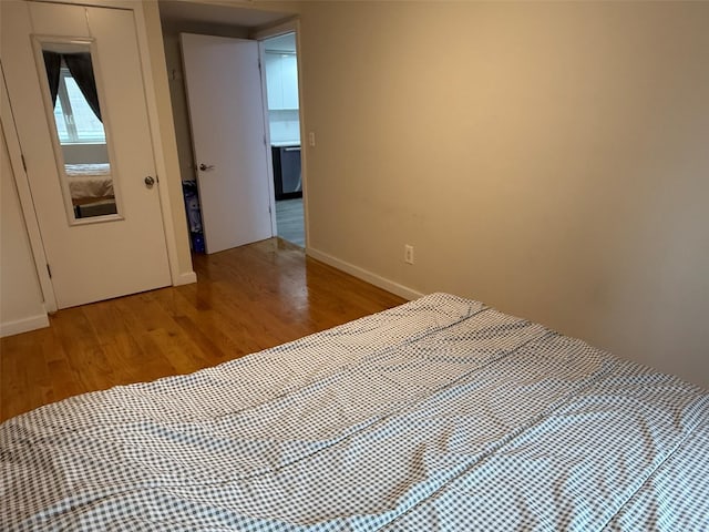 158-15 Union Tpke Unit 204N, Fresh Meadows, NY 11366 - bedroom featuring light wood-style floors and baseboards