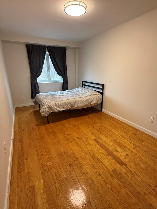 158-15 Union Tpke Unit 204N, Fresh Meadows, NY 11366 - bedroom featuring wood finished floors