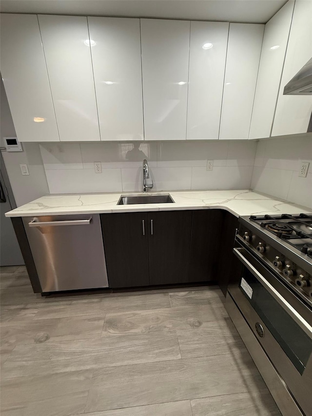 158-15 Union Tpke Unit 204N, Fresh Meadows, NY 11366 - kitchen with modern cabinets, stainless steel appliances, and white cabinets