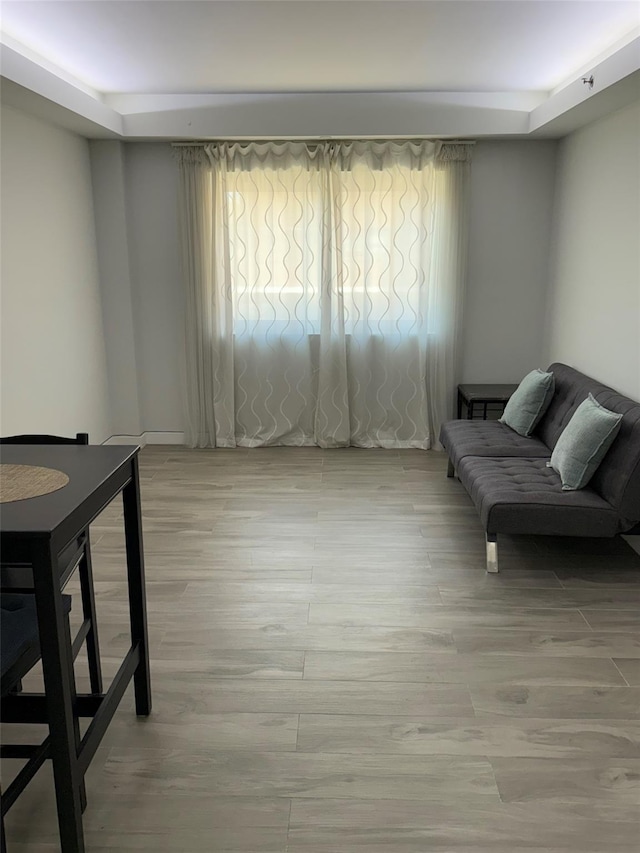 158-15 Union Tpke Unit 204N, Fresh Meadows, NY 11366 - living area featuring plenty of natural light and light wood-style flooring