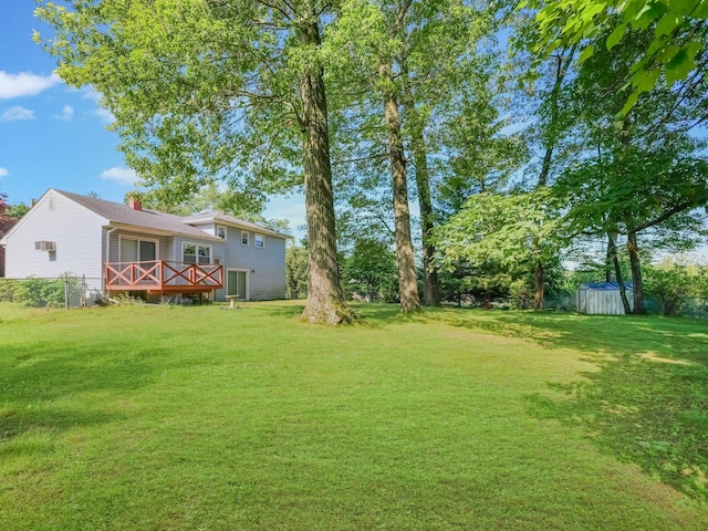 34 Crambrook Rd, New City, NY 10956 - view of grassy yard featuring a deck and a storage unit