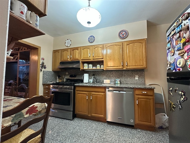 82-48 Eliot Ave, Middle Village, NY 11379 - kitchen featuring stainless steel appliances, under cabinet range hood, open shelves, dark stone counters, and decorative backsplash