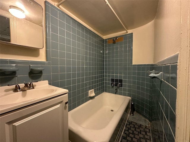 82-48 Eliot Ave, Middle Village, NY 11379 - bathroom with tile walls, tub / shower combination, and vanity