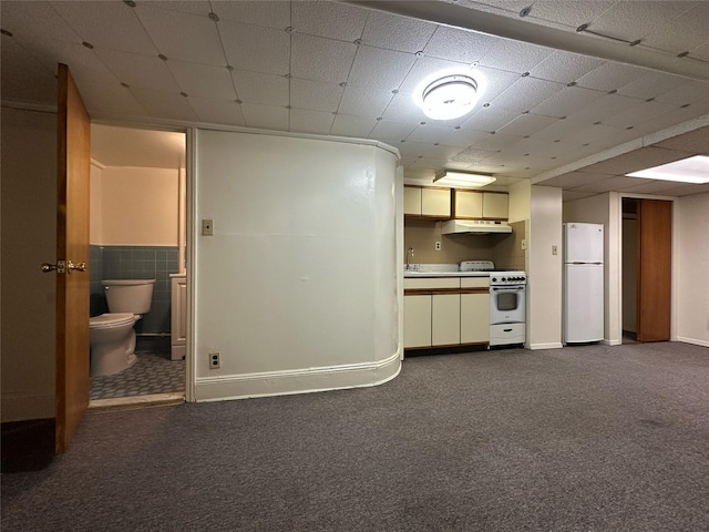 82-48 Eliot Ave, Middle Village, NY 11379 - unfurnished living room featuring dark carpet and a sink