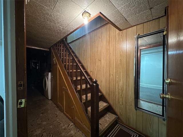82-48 Eliot Ave, Middle Village, NY 11379 - stairs with washing machine and clothes dryer and wooden walls