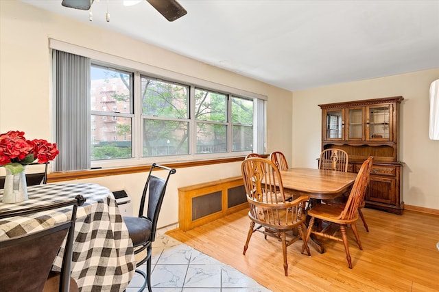 151-25 88th St Unit 1D, Howard Beach, NY 11414 - dining area with ceiling fan and light marble finish flooring