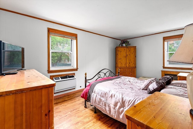 151-25 88th St Unit 1D, Howard Beach, NY 11414 - bedroom featuring ornamental molding and light wood-style flooring