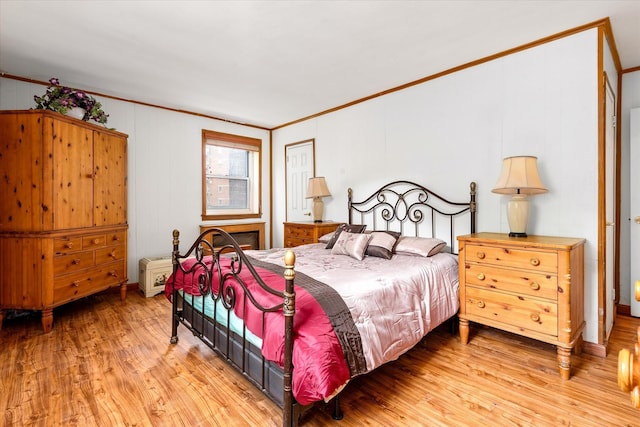 151-25 88th St Unit 1D, Howard Beach, NY 11414 - bedroom with ornamental molding and light wood-type flooring