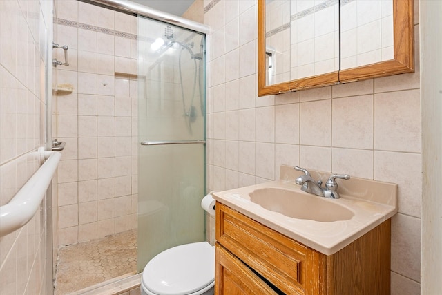 151-25 88th St Unit 1D, Howard Beach, NY 11414 - bathroom with tile walls, a stall shower, and vanity