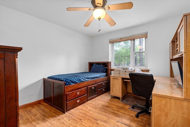 151-25 88th St Unit 1D, Howard Beach, NY 11414 - bedroom featuring light wood-style floors, a desk, and ceiling fan