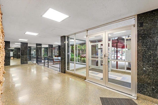 151-25 88th St Unit 1D, Howard Beach, NY 11414 - building lobby with a textured ceiling and expansive windows