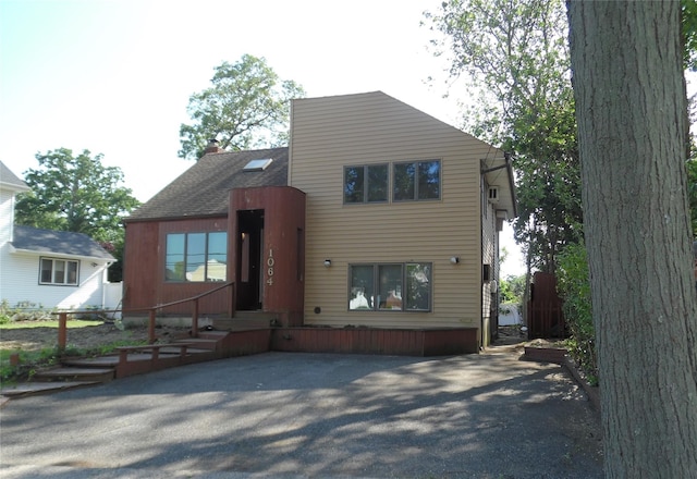 1064 Barbara Ct, North Bellmore, NY 11710 - view of front of property with a chimney