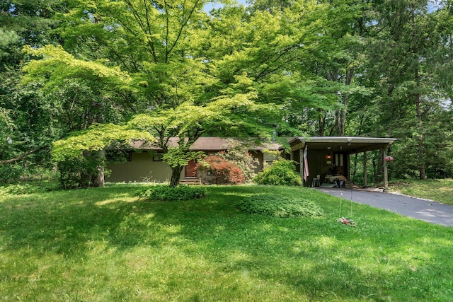 41 Colburn Dr, Poughkeepsie, NY 12603 - view of grassy yard featuring asphalt driveway and an attached carport