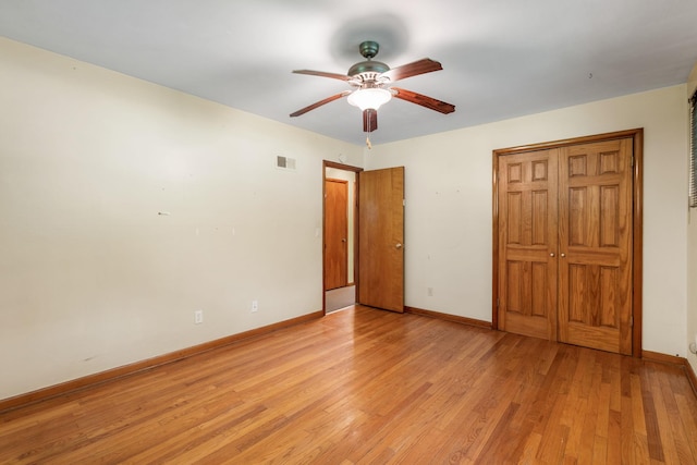 41 Colburn Dr, Poughkeepsie, NY 12603 - unfurnished bedroom with light wood-type flooring, ceiling fan, and a closet