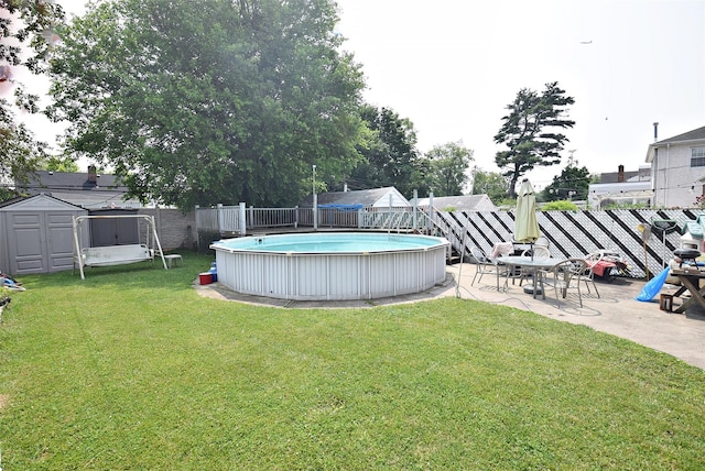 4723 164th St, Flushing, NY 11358 - fenced backyard with a storage shed and a patio area