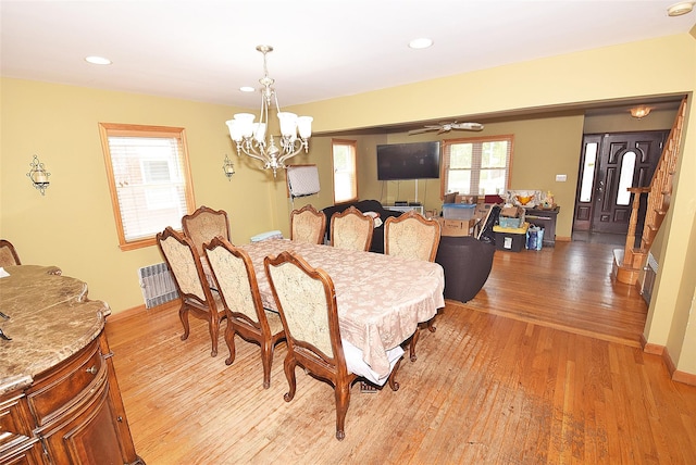 4723 164th St, Flushing, NY 11358 - dining area with light wood finished floors, a chandelier, a ceiling fan, recessed lighting, and radiator