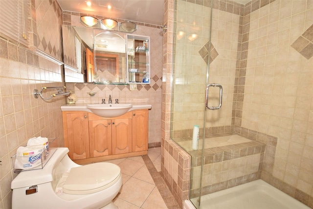 4723 164th St, Flushing, NY 11358 - full bathroom with tile walls, tile patterned flooring, vanity, and a stall shower