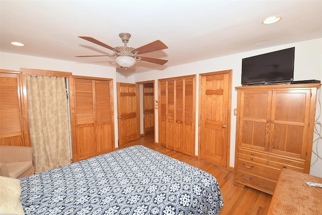 4723 164th St, Flushing, NY 11358 - bedroom featuring two closets, light wood-style floors, recessed lighting, and ceiling fan