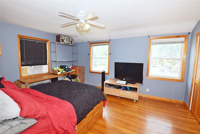 4723 164th St, Flushing, NY 11358 - bedroom with wood finished floors and cooling unit