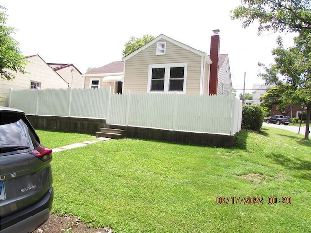 2 Leffingwell Pl, New Rochelle, NY 10801 - view of side of home with a chimney
