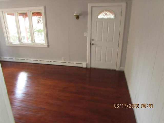 2 Leffingwell Pl, New Rochelle, NY 10801 - foyer entrance featuring baseboard heating and wood finished floors