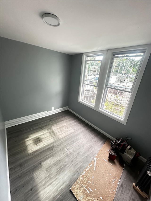 1661 E 172nd St, Bronx, NY 10472 - unfurnished room with wood finished floors and baseboards