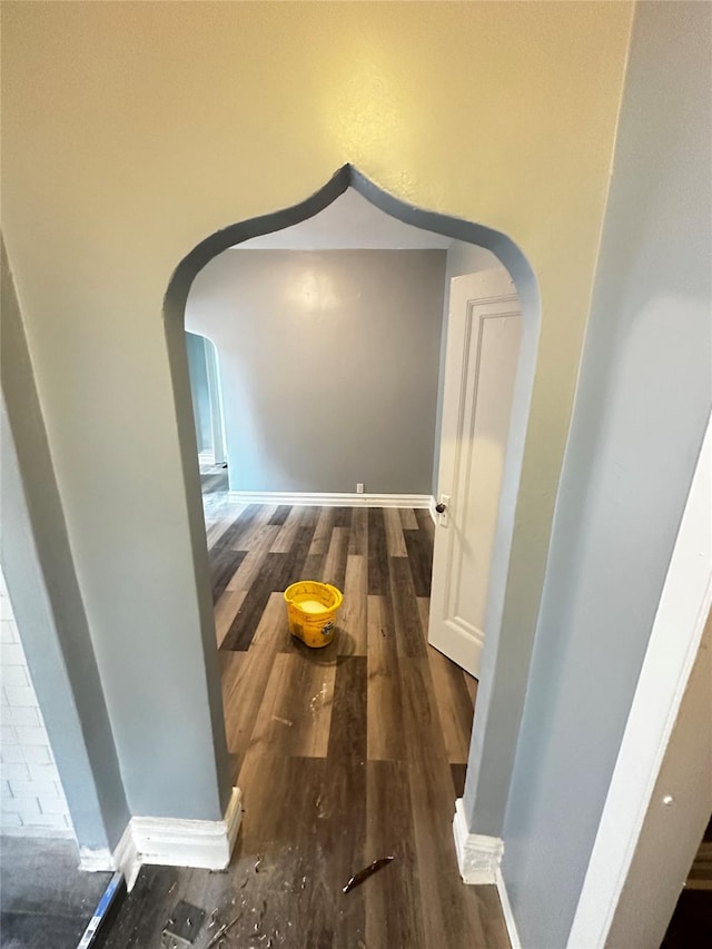 1661 E 172nd St, Bronx, NY 10472 - hall featuring arched walkways and wood finished floors