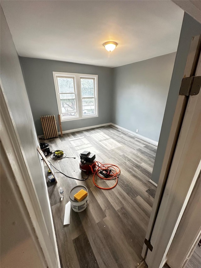 1661 E 172nd St, Bronx, NY 10472 - spare room with wood finished floors