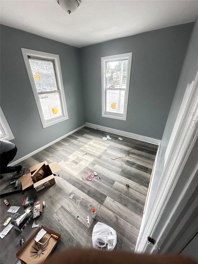 1661 E 172nd St, Bronx, NY 10472 - spare room with baseboards and wood finished floors