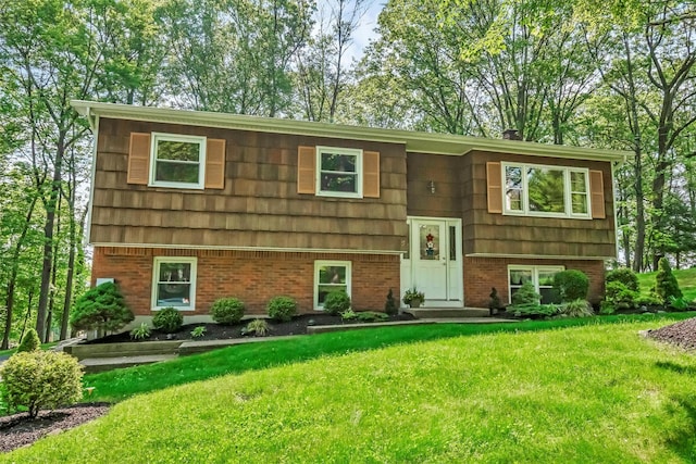 17 Woodrum Dr, Stony Point, NY 10980 - bi-level home featuring a front lawn and brick siding