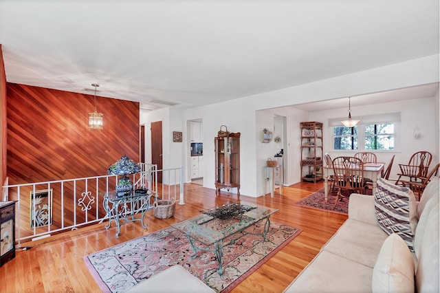 17 Woodrum Dr, Stony Point, NY 10980 - living room with wooden walls and wood finished floors