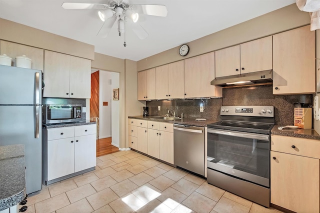 17 Woodrum Dr, Stony Point, NY 10980 - kitchen with stainless steel appliances, under cabinet range hood, ceiling fan, decorative backsplash, and dark countertops
